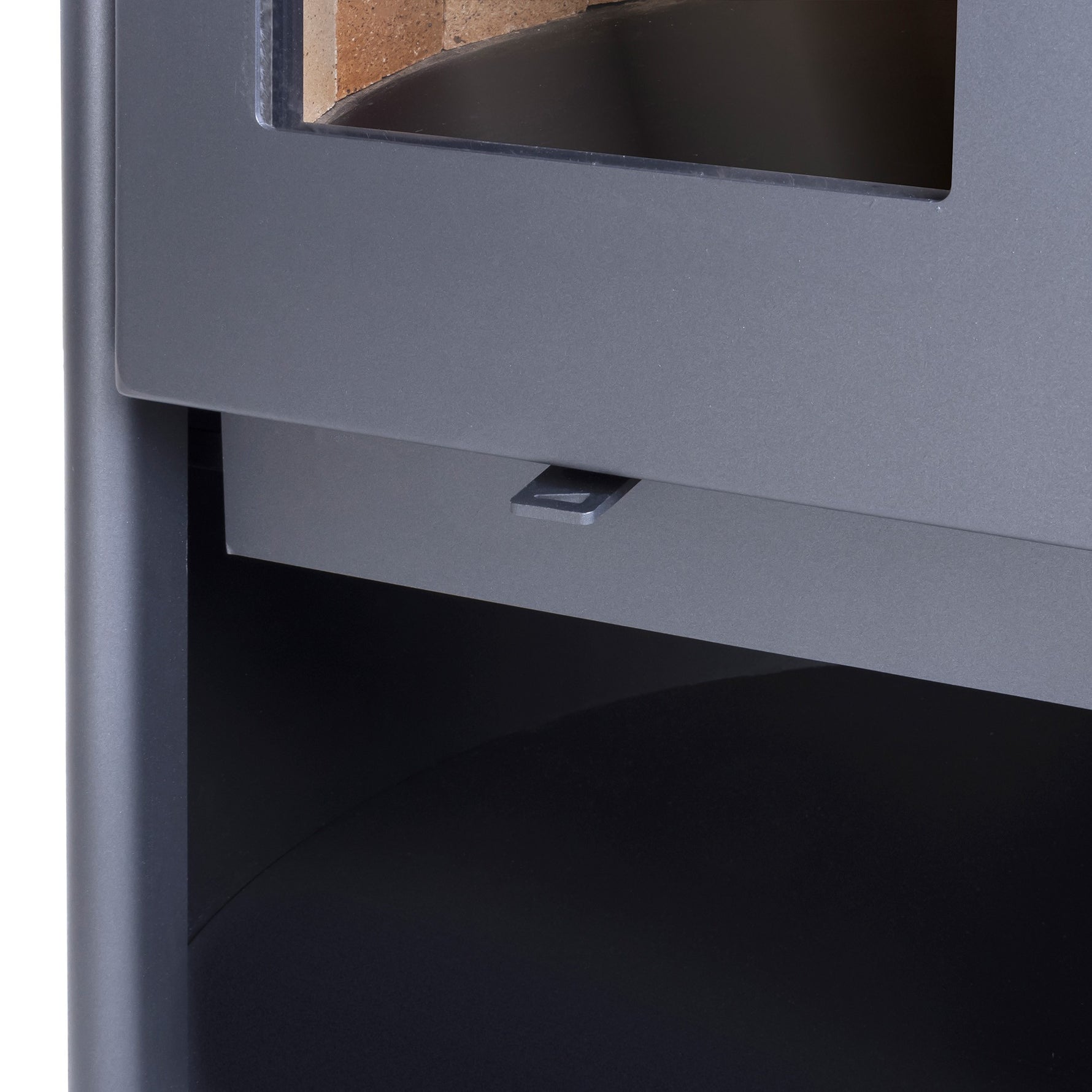 Detalle del compartimento de leña de la estufa Rondo 450 Design.